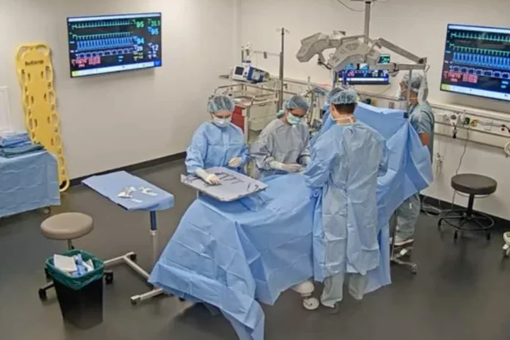 Trainees completing an operating room team exercise
